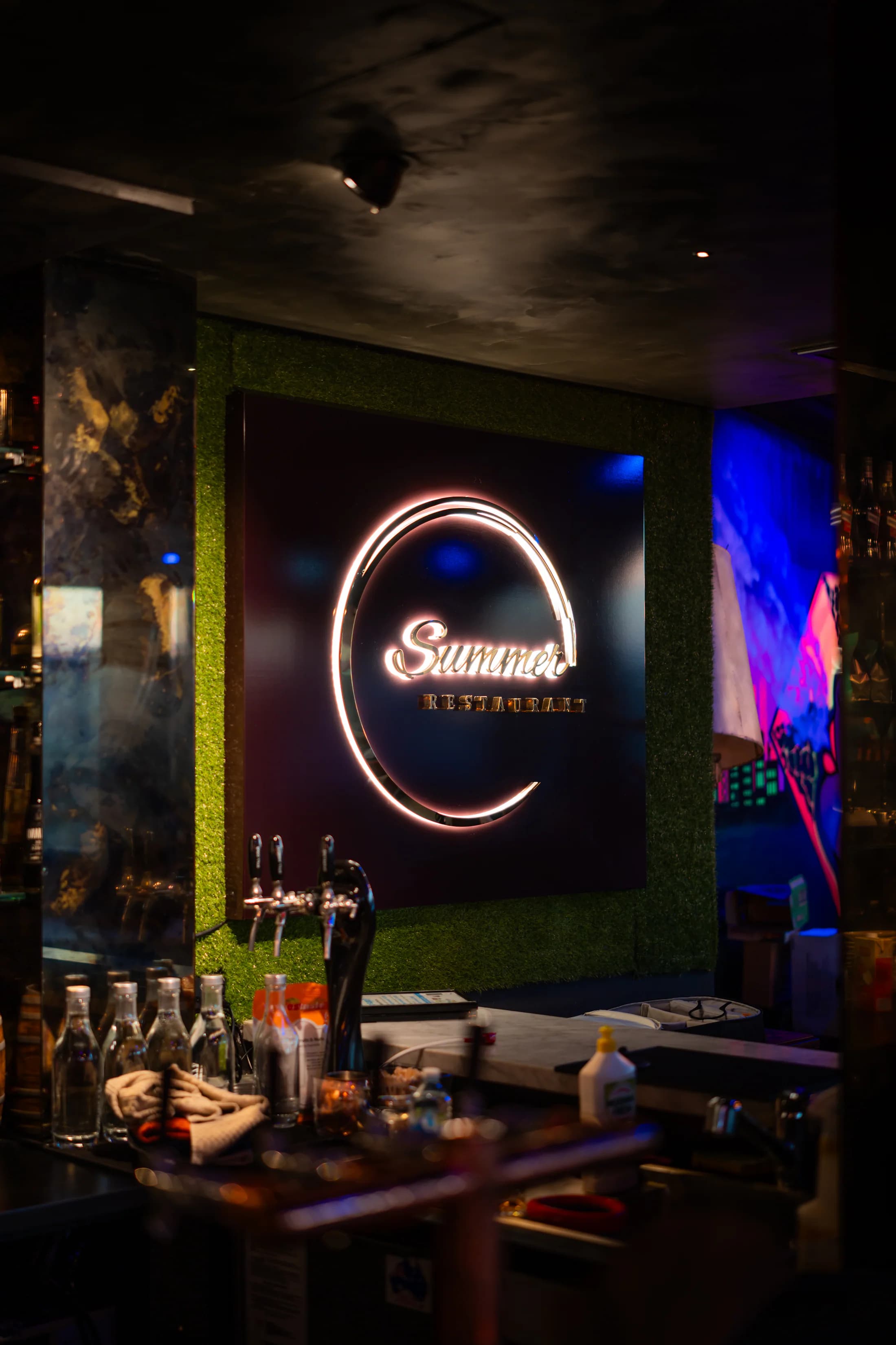 The illuminated bar inside Summer Restaurant